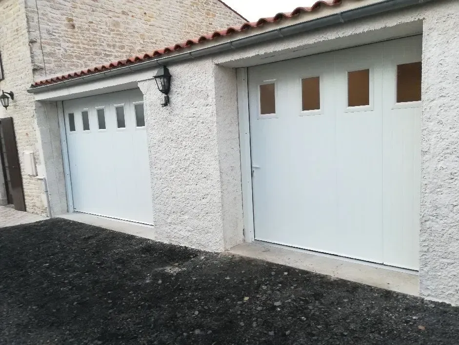 Portes de garage avec déplacement latérawebp
